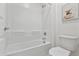 Bathroom featuring a shower/tub combination and a decorative art print at 15718 W Polk St, Goodyear, AZ 85338