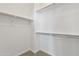 Walk in closet with shelving at 15718 W Polk St, Goodyear, AZ 85338