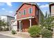 Charming two-story home with a covered front porch and an attached two-car garage at 15718 W Polk St, Goodyear, AZ 85338