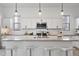Close up of the kitchen island with granite countertops and stainless steel appliances at 15718 W Polk St, Goodyear, AZ 85338