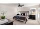 Comfortable bedroom featuring carpet floors, windows for natural light and ceiling fan at 16627 N Slate Ln, Maricopa, AZ 85139