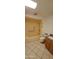 Bathroom with a combination tub and shower and granite vanity at 17056 N 107Th Ave, Sun City, AZ 85373
