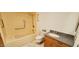 Bathroom featuring granite vanity and a bath and shower combination with grab bar at 17056 N 107Th Ave, Sun City, AZ 85373