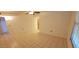 Bedroom with neutral tile flooring, white walls, closet and a ceiling fan at 17056 N 107Th Ave, Sun City, AZ 85373