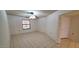 Spacious bedroom featuring tile floors, ceiling fan and a window at 17056 N 107Th Ave, Sun City, AZ 85373