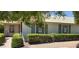 Charming single-story home showcasing manicured landscaping and decorative window details at 17056 N 107Th Ave, Sun City, AZ 85373