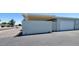 This home boasts a well-maintained exterior, featuring a private gate and a convenient garage, with a covered carport at 17056 N 107Th Ave, Sun City, AZ 85373