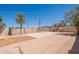 Large backyard with a pool, patio, and mature landscaping, perfect for outdoor entertaining at 1811 W Roma Ave, Phoenix, AZ 85015