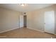 Empty bedroom with tile flooring and a closet at 1811 W Roma Ave, Phoenix, AZ 85015