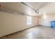 Spacious garage with ample storage space and a window for natural light at 1811 W Roma Ave, Phoenix, AZ 85015