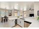 Open kitchen with a wine cooler, stainless steel appliances, and a breakfast nook with dining table at 1819 W Deer Creek Rd, Phoenix, AZ 85045