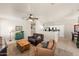 Open-concept living room with a seamless transition to the kitchen and dining areas at 1819 W Deer Creek Rd, Phoenix, AZ 85045