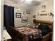 This charming bedroom features a bed with warm accents and unique horse-themed decor at 20931 E Desert Hills Blvd, Queen Creek, AZ 85142