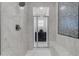 Bathroom showcasing the shower with marble tile, mosaic accents, and a built in shower seat at 2219 E Galileo Dr, Gilbert, AZ 85298
