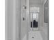 Modern bathroom highlighting a glass enclosed shower with marble tiling and a shower seat at 2219 E Galileo Dr, Gilbert, AZ 85298