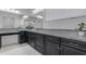 Bathroom vanity with dark cabinets, granite countertops, and decorative mirrors at 2219 E Galileo Dr, Gilbert, AZ 85298