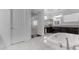 Bathroom view showcasing a soaking tub with tile detail and granite counters at 2219 E Galileo Dr, Gilbert, AZ 85298