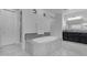 Bright bathroom showcasing an oversized tub, walk-in shower, and tile surround at 2219 E Galileo Dr, Gilbert, AZ 85298