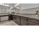 Elegant bathroom vanity with granite countertop, modern fixtures and decorative tile backsplash at 2219 E Galileo Dr, Gilbert, AZ 85298