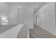 Bright bedroom offering neutral décor, a large window, and carpet at 2219 E Galileo Dr, Gilbert, AZ 85298