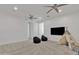 Large bonus room features neutral carpet, teepee and comfortable seating at 2219 E Galileo Dr, Gilbert, AZ 85298