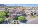 Beautiful two-story home with a well-manicured yard and tiled roof at 2219 E Galileo Dr, Gilbert, AZ 85298