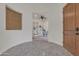 Inviting foyer with decorative tile flooring, arched entryway, and view of the office space offers a stylish welcome at 2219 E Galileo Dr, Gilbert, AZ 85298