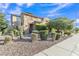 Charming front yard with manicured landscaping, stone accents, and a well-maintained lawn at 2219 E Galileo Dr, Gilbert, AZ 85298
