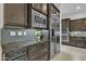Spacious kitchen with stainless steel appliances, granite countertops, and ample cabinet space at 2219 E Galileo Dr, Gilbert, AZ 85298