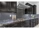 Kitchen featuring stainless steel appliances, granite countertops, and stylish backsplash at 2219 E Galileo Dr, Gilbert, AZ 85298
