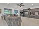Spacious living room featuring custom built-ins and a large sectional sofa, perfect for relaxation at 2219 E Galileo Dr, Gilbert, AZ 85298