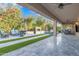 Inviting covered patio with stone floors and a beautiful outdoor setting at 2219 E Galileo Dr, Gilbert, AZ 85298