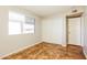 Bedroom with window, closet, and neutral paint at 2227 N 57Th Dr, Phoenix, AZ 85035