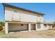 Two-story home featuring stucco exterior, multiple balconies, and a large covered patio at 2227 N 57Th Dr, Phoenix, AZ 85035
