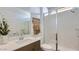 Modern bathroom featuring a glass enclosed shower, stylish vanity, and neutral tones at 23334 W Mobile Ln, Buckeye, AZ 85326