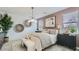 Inviting bedroom with contemporary decor, offering a peaceful and stylish retreat at 23334 W Mobile Ln, Buckeye, AZ 85326