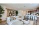 Living room showcasing comfortable seating, contemporary decor, and an open layout to the kitchen at 23334 W Mobile Ln, Buckeye, AZ 85326