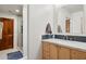 Stylish bathroom showcasing a modern vanity with marble countertop and a glass-enclosed shower at 24200 N Alma School Rd # 7, Scottsdale, AZ 85255
