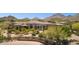 Stunning desert home boasting stone accents, mature landscaping and paver driveway at 24200 N Alma School Rd # 7, Scottsdale, AZ 85255