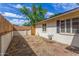 Cozy side yard area with new fence, offering potential for a private outdoor space at 2938 N 18Th Ave, Phoenix, AZ 85015