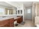Large Primary bathroom featuring tile floors, dual vanity sinks, and private shower and tub at 2993 E Meadowview Dr, Gilbert, AZ 85298
