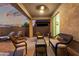 Comfortable covered patio featuring lounge seating, ideal for relaxation and outdoor enjoyment during sunset at 2993 E Meadowview Dr, Gilbert, AZ 85298