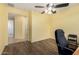 Bright office space with wood floors and a ceiling fan and chairs at 2993 E Meadowview Dr, Gilbert, AZ 85298