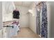 Walk-in closet with shelves and hanging rods for storage at 2993 E Meadowview Dr, Gilbert, AZ 85298