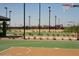 Outdoor basketball court and playground area, great for Gathering fun and exercise at 30165 W Flower St, Buckeye, AZ 85396