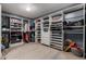 Spacious walk-in closet with custom white shelving and gray walls at 30165 W Flower St, Buckeye, AZ 85396