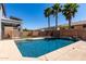Sparkling pool surrounded by a lush backyard oasis, perfect for outdoor enjoyment at 30165 W Flower St, Buckeye, AZ 85396