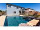 Backyard pool with a covered patio and fenced-in area at 30165 W Flower St, Buckeye, AZ 85396