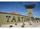 The Tartesso community entrance sign with decorative plants at 30165 W Flower St, Buckeye, AZ 85396