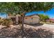 Charming single-Gathering home with desert landscaping, shade trees, and a two-car garage at 30259 N Sunray Dr, San Tan Valley, AZ 85143